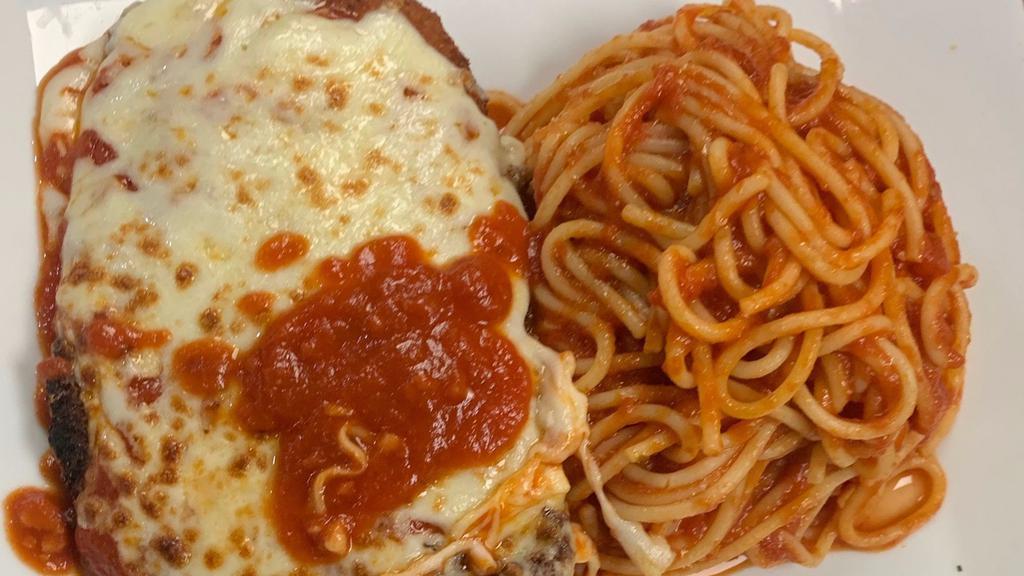 Chicken Parmesan · Breaded chicken cutlet baked with marinara sauce and mozzarella cheese served with spaghetti marinara