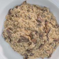 4 Mushroom Risotto · Arboreal rice with porcini, champignon, shiitake, truffle oil.