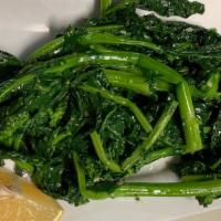 Sautéed Spinach · Fresh spinach sautéed with garlic, imported olive oil and lemon