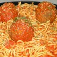 Spaghetti And Meatballs · Served with bread and small salad.