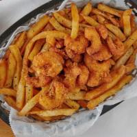 Popcorn Shrimp In A Basket · With tartar sauce and marinara. Served with french fries and small salad.