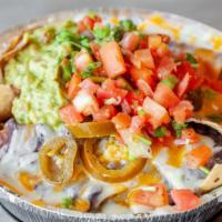 Nachos · Served With: Crispy corn tortillas smothered cheese, beans, and sour cream. Add Meats for ad...