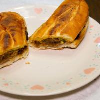 Cuban Sandwich · Special. Roasted pork, ham, Swiss cheese, pickles, mustard, and garlic mojo.