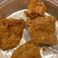 Chicharron De Pollo · Marinated and Floured deep-fried boneless chicken chunks.