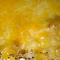 Pastelon De Picadillo Y Platano · Ground beef, layered with ripe plantains and melted cheese. This item comes with only one si...