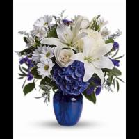 Beautiful In Blue · In this arrangement, the serenity of the color blue along with the purity of intention symbo...