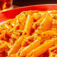 Penne Alla Vodka · Our famous pink cream sauce with or without ground beef.