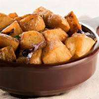 Home Fries · Side of our famous home fries.