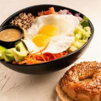 Breakfast Power Bowl · Tri-color quinoa, leafy greens, fresh veggies, 3 sunny side ups; open choices.