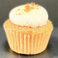 Cursed Carrot (Mini) · Carrot cake with hazelnuts, currants, pineapple & coconut, cream cheese frosting, candied ca...