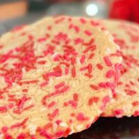 Sugar-Coma Cookie · Our irresistibly sweet sugar cookie is drenched in seasonal sprinkle blends and baked to a l...