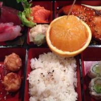 Salmon Sushi Lunch · Served with five pieces of salmon sushi and one salmon roll. Served with miso soup and house...