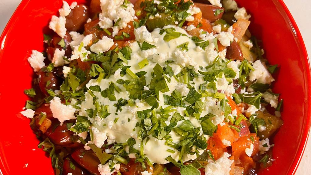 Greek Bowl · Rice, tomatoes, red onions, cucumber, kalamata olives feta cheese, tzatziki sauce and fresh parsley.