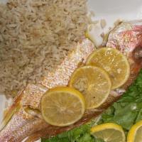 Whole Baked Red Snapper · Served with choice of one side.