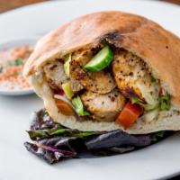 Chicken Kebab Sandwich · Salad, tahini, pickles in pita bread. Served with a choice of fries or salad.