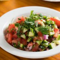 Arabic Salad · Finely chopped cucumber, tomato, red onion with herbs, lemon juice and olive oil