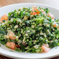 Tabouli · Classic middle eastern salad made with bulgur (gluten), tomatoes, herbs, lemon juice and oli...