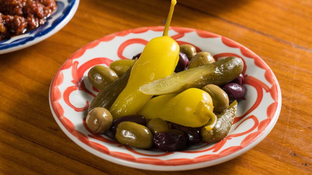 Olives & Pickles Mezze · Black Kalamata olives, green cracked olives from Lebanon, pickled cucumbers and pickled spicy peppers
