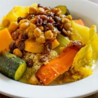 Vegetarian Couscous · Served with vegetables, bouillon, chickpeas, caramelized onions and raisins