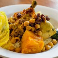 Chicken Couscous · Served with vegetables, bouillon, chickpeas, caramelized onions and raisins