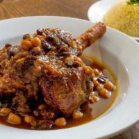 Lamb Shank Tagine · Popular. Long simmered stew and your choice of sauce. Served with basmati rice or couscous.