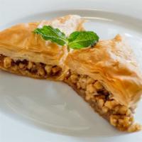 Walnut  Baklava · A traditional layered pastry dessert made of filo pastry and filled with walnuts. Sweetened ...