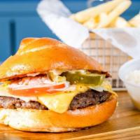 Cheeseburger · Beef patty, lettuce, tomato, mayo, pickles, American cheese. All burgers come with side of c...
