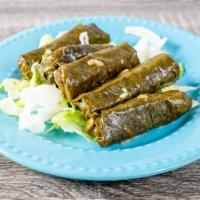 Homemade Grape Leaves · 5 pieces come with each order. Home made grape leaves in either Lebanese style with lemon sa...
