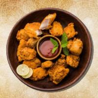 Chicken Pakora Pleasure  · Mildly spiced morsels of chicken batter fried till crisp and golden