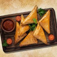 Meat Samosa So Good  · Two crisp filo pastry dumplings filled with 	with spiced mince meat