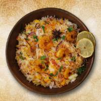 Classic Shrimp Biryani · Long grained rice flavored with fragrant spices flavored along with saffron and layered with...