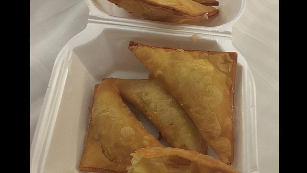 Crab Rangoon (8) · Eight pieces.