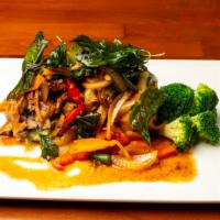 Duck Gra Prow · Not halal. Double spicy. Thai chilies, string beans, bell peppers, carrots, and basil.