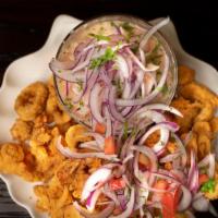 Classico · A Traditional combination of fish ceviche and batter-coated fried calamari, mussels, shrimps...