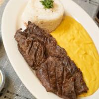 Entrana A La Parrilla · Good steak with rice and mashed potatoes