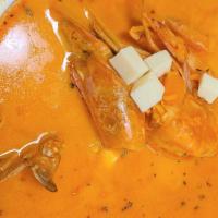 Chupe De Mariscos · A rich milky seafood soup brewed to perfection and accompanied by Calamari, shrimps, squids,...