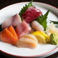 Sashimi Selection · Chef's choice of 12 pcs of sashimi, rice, and miso soup.