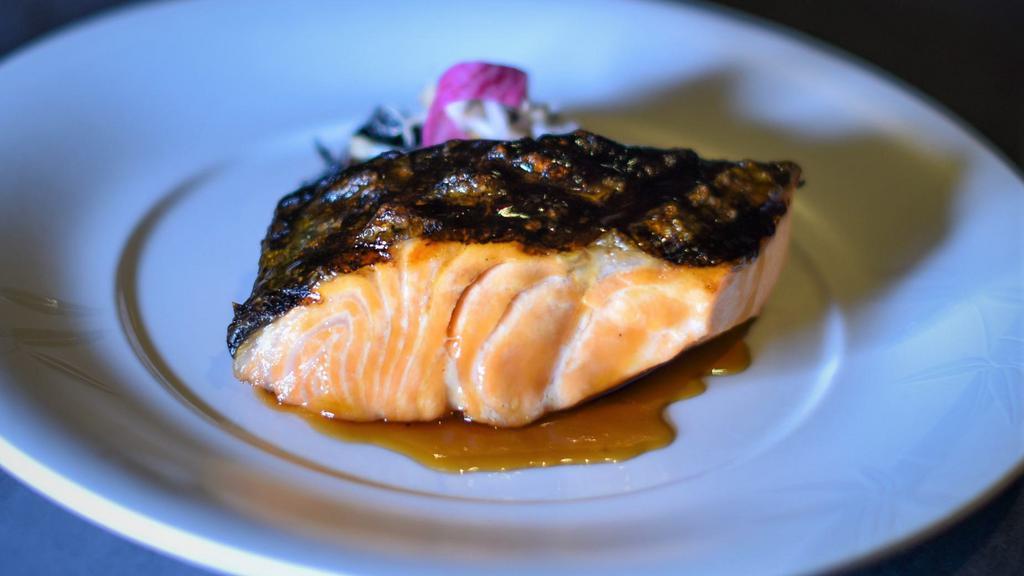 Grilled Salmon · Scottish salmon grill medium rare with your choice of sauce.