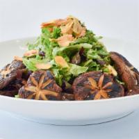 Shiitake Salad With Spicy Lemon Dressing · Grilled shiitake mushrooms and field greens with spicy lemon dressing.