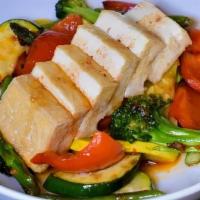 Tofu And Vegetables Spicy Garlic · Tofu and seasonal vegetable sauteed with spicy garlic sauce.