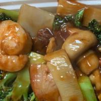 Happy Family · Scallop, jumbo shrimp, chicken, and beef with mixed Chinese vegetables in brown sauce. With ...