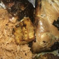 Jerk Chicken · Original charcoal smoked chicken with rice and peas or festival.