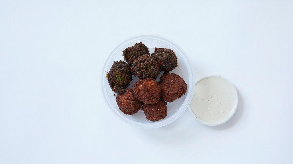 Falafel + Tahini · Choose traditional green or our spicy harissa falafel - or do a mix of both! Includes 8 falafel balls.  Served with a side of creamy tahini sauce.