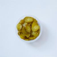 Pickles Side · Our fresh Israeli pickles (1/2 pint).