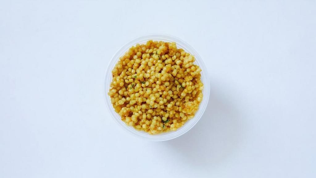 Pearl Couscous Side · Warm couscous with the delicious flavor of turmeric, cumin, and caramelized onions (1/2 pint).