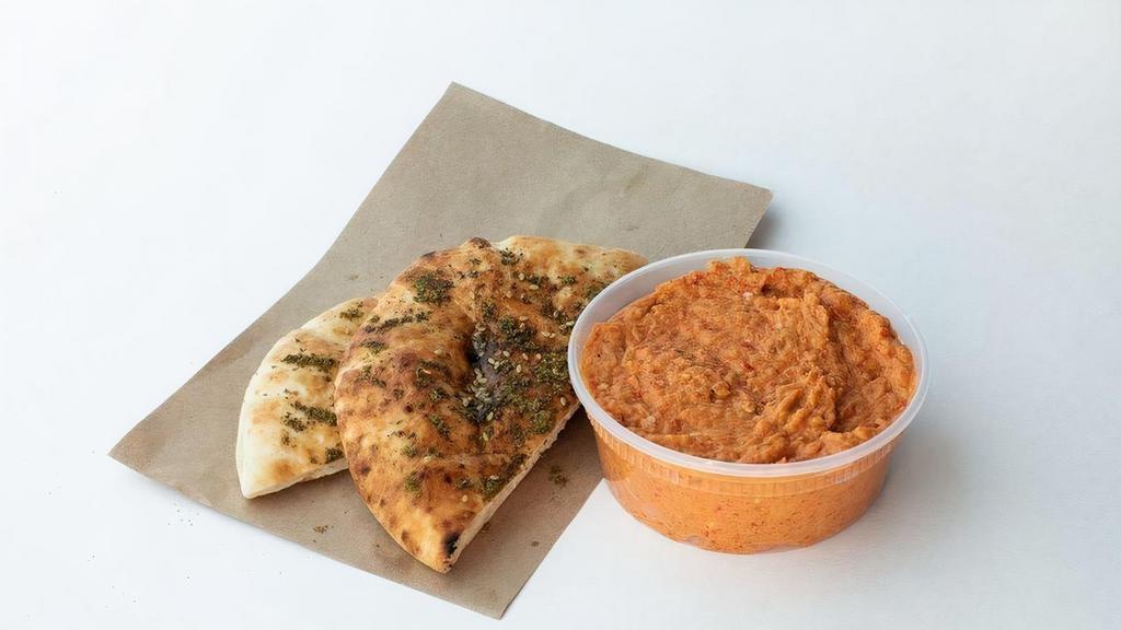 Red Pepper Babaganoush + Za'Atar Pita · Creamy and flavorful smoked eggplant, roasted red peppers, tahini & a blend of spices.   Served with a za'atar pita. Pint includes 2 pitas and a quart comes with 4 pitas.