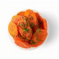 Moroccan Carrots · Sauteed carrots infused with garlic, paprika, cumin, extra virgin olive oil and tomato paste.