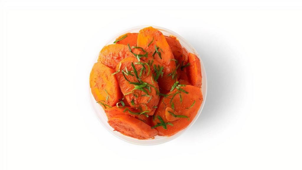 Moroccan Carrots · Sauteed carrots infused with garlic, paprika, cumin, extra virgin olive oil and tomato paste.