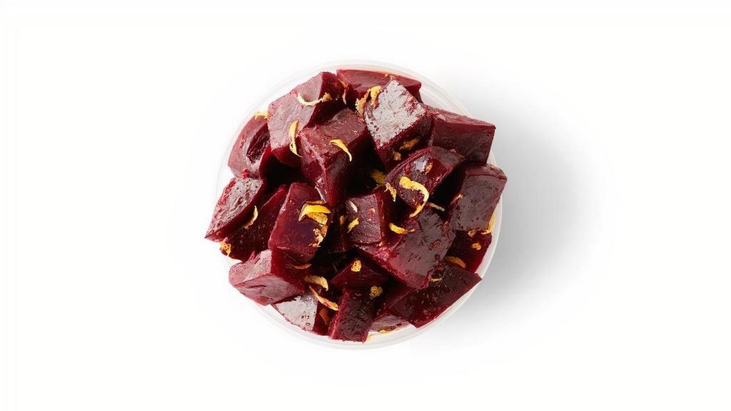 Marinated Beets · Cooked beets infused with roasted garlic, coriander, lemon zest & extra virgin olive oil.