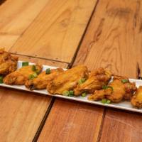 Island Wings · Our Fresh Wings Are Seasoned, Deep Fried & Hand Tossed In Our Authentic Sauces – Choice of: ...
